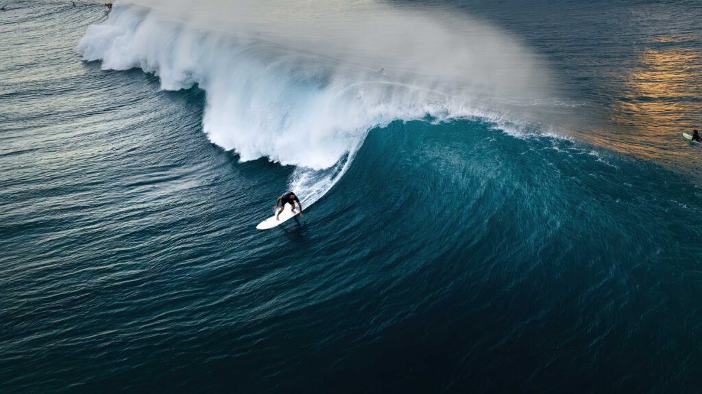 Surfer on a wave in hawaii